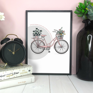 illustration of pink bike and quote - difficult roads often lead to beautiful destinations - designed by PaperJack Illustrates