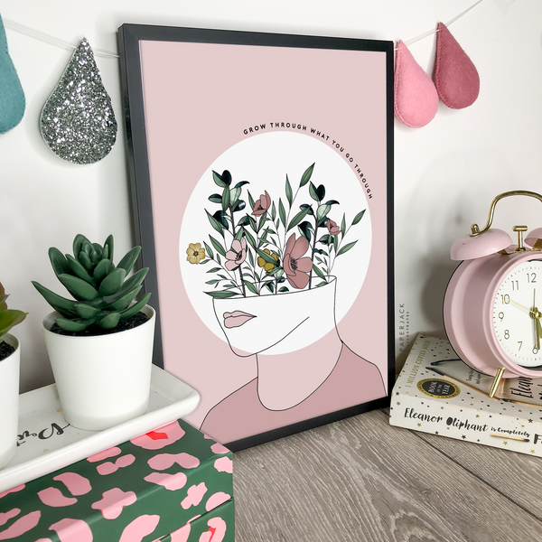 line art illustration of womans head with flowers growing out of it and quote - grow through what you go through - designed by PaperJack Illustrates