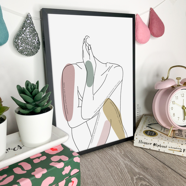 White print with outline of female sitting down and block colours of pink, grey and ochre with positive words - designed by paperjack illustrates