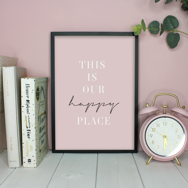 PaperJack Illustrates wall art - This is our happy place quote in white on pink background in a frame