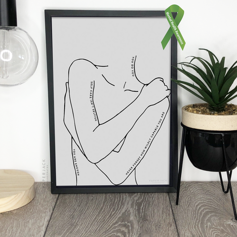 PaperJack Illustrates wall art print with grey background and a black outline of a person hugging themselves and positive affirmation words written